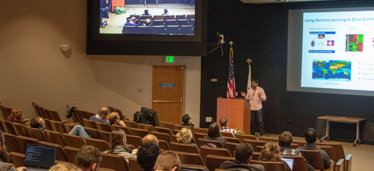 Jay presenting his research in front of an audience