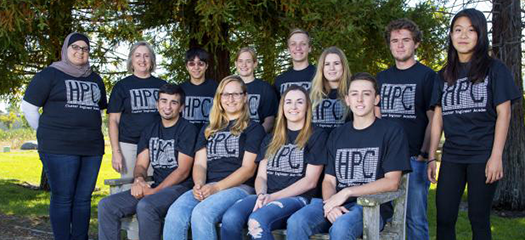 students and mentors posed as a group outside