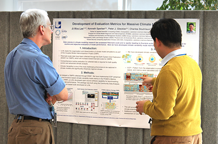 Ji-woo Lee presenting his poster to new AD, Bruce Hendrickson