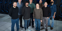 the Systems Software and Security group standing in front of the Sierra supercomputer